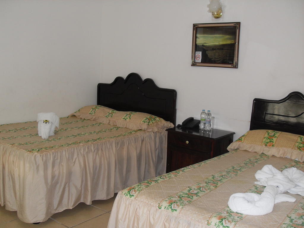 Hostal Del Cid Катемако Экстерьер фото