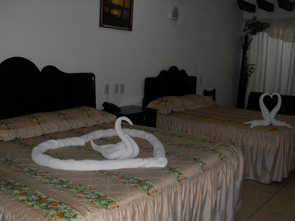 Hostal Del Cid Катемако Экстерьер фото